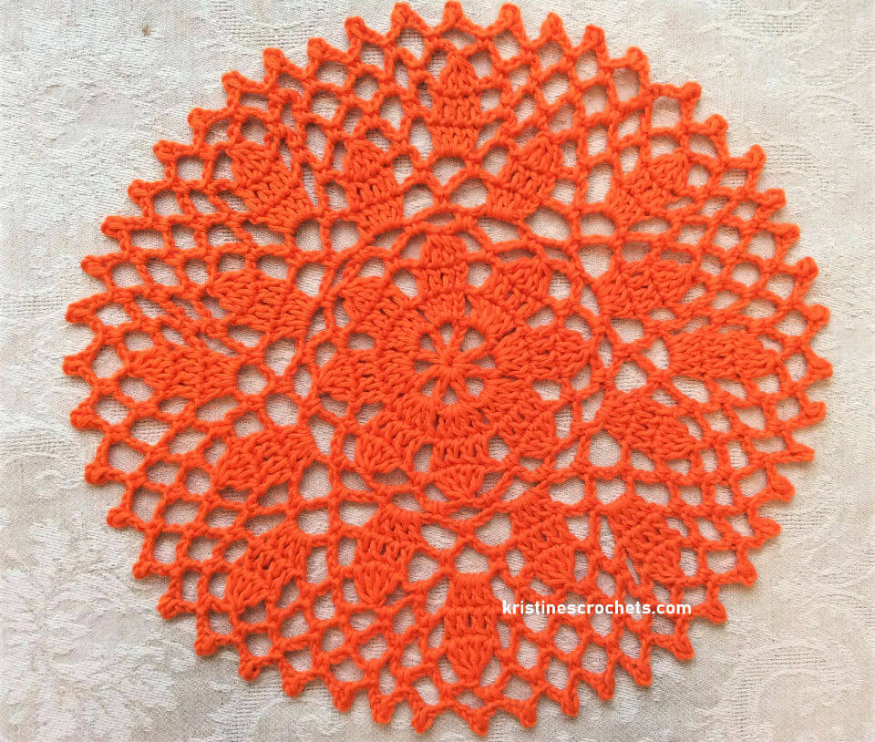 Crochet orange petal doily
