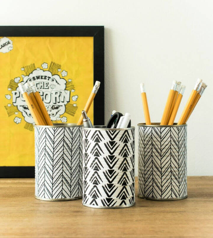 Pen holder with empty tin can