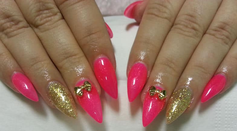 Pink and Gold Stiletto Nails with Bow