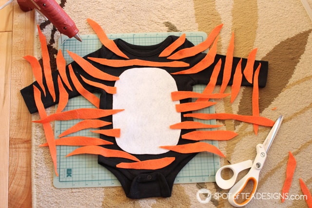 Barely sewn tiger bodysuit