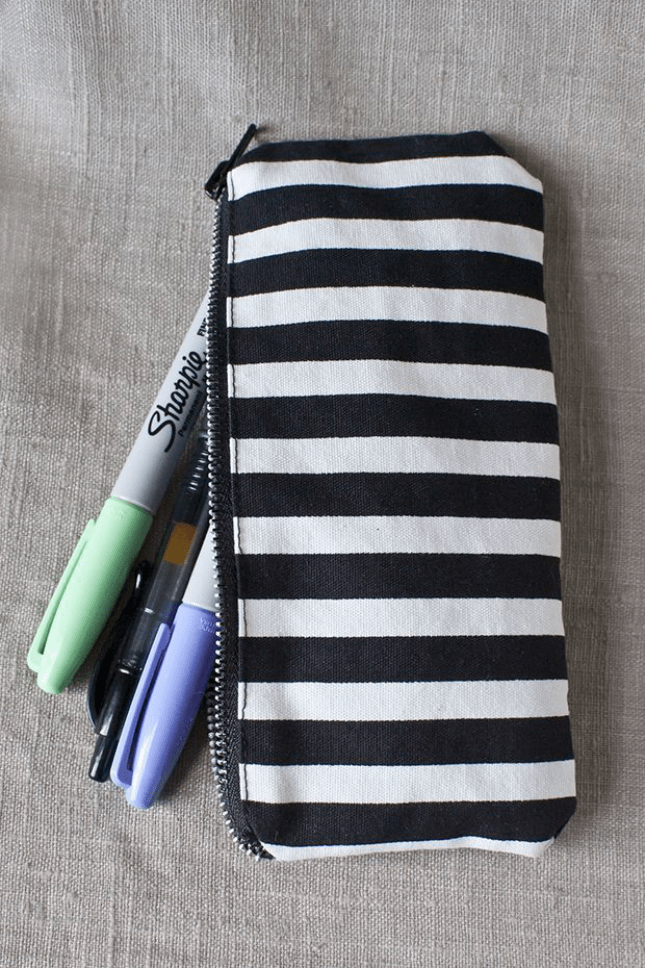 Zip black and white striped pouch