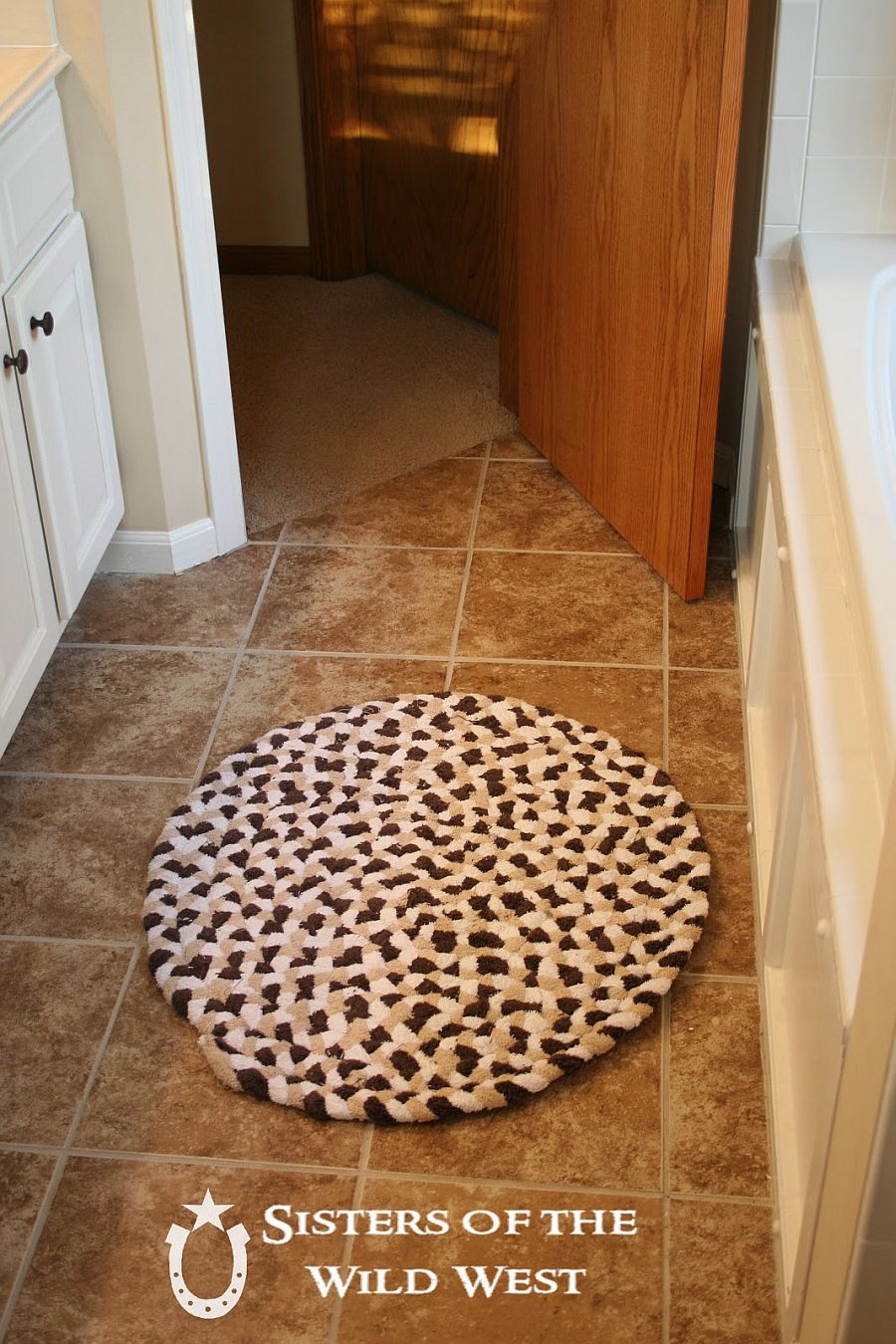 Woven towel bath mat