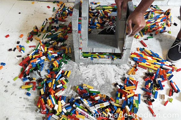 Take Lego bricks out of concrete nesting table